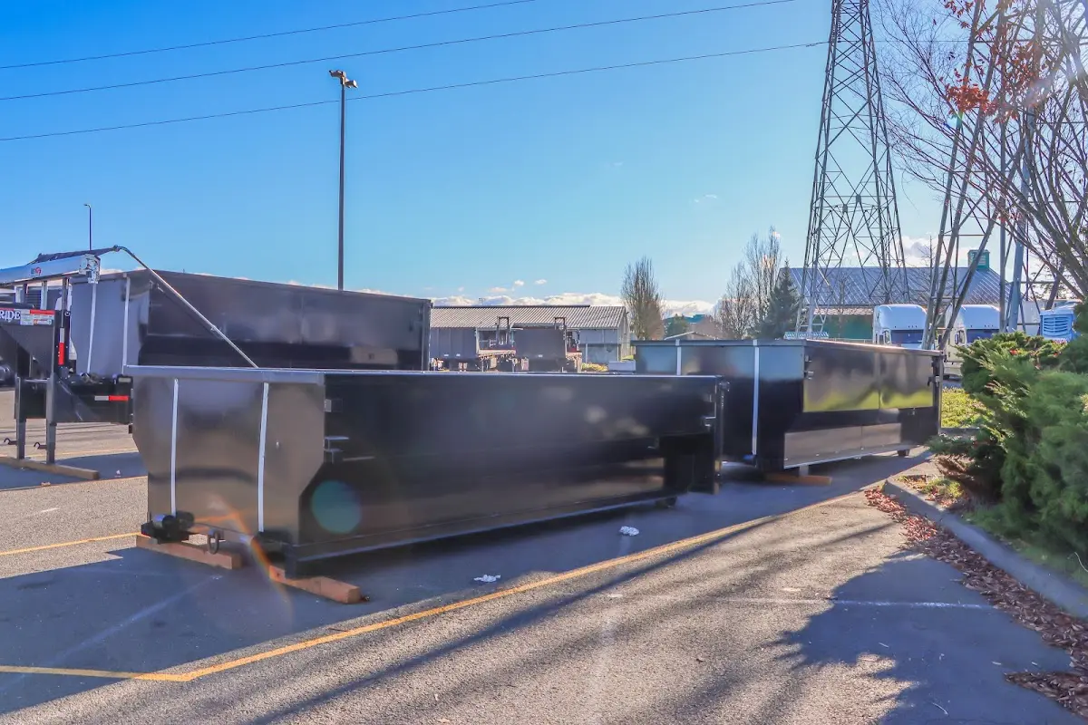Roll-off dumpster ready for waste disposal at job site for Construction Dumpster Rental in Mims